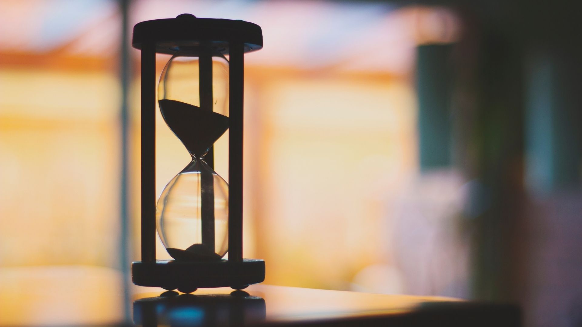 an hour glass on top of the table