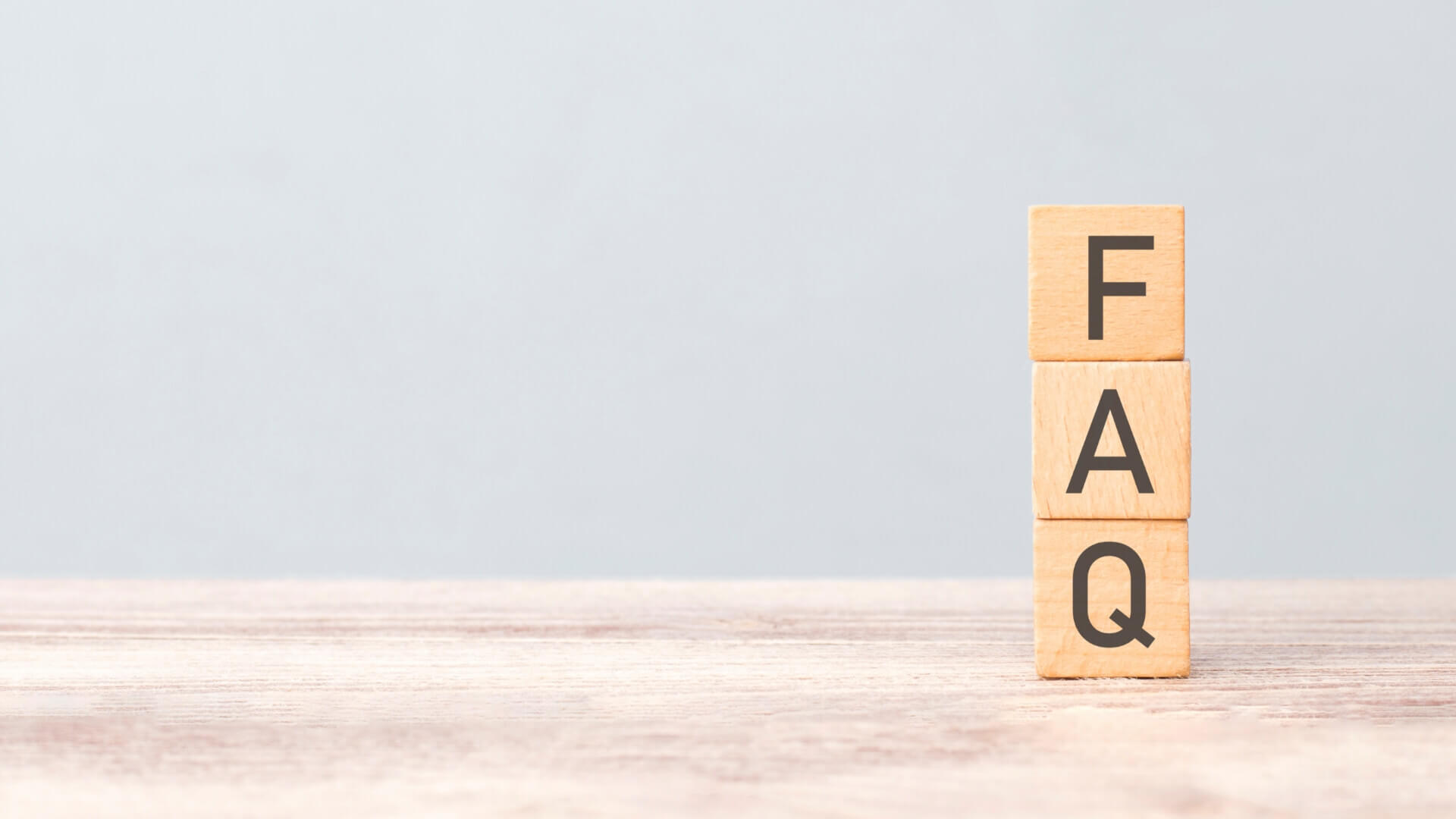 FAQ in the block of wood above the table