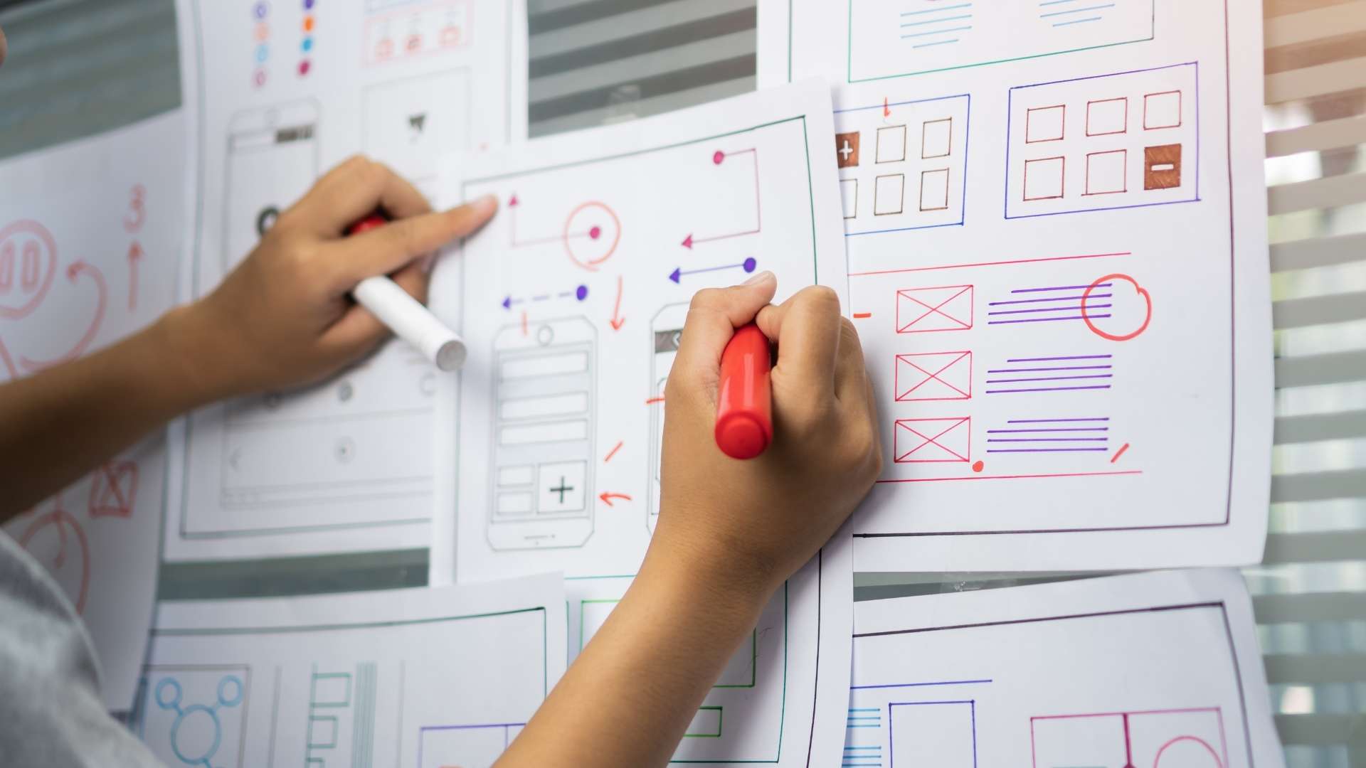 interface ideas drawn on paper