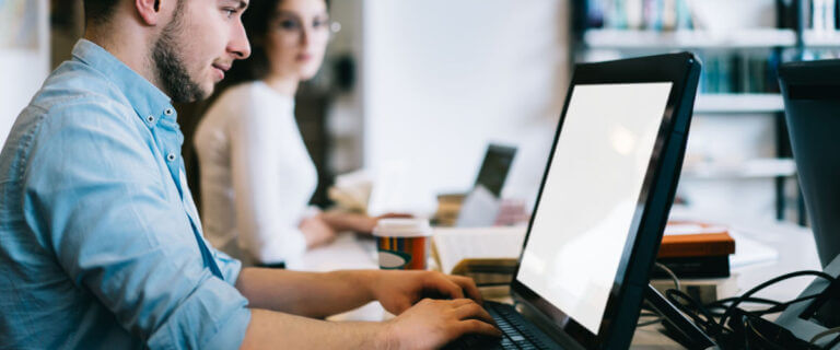 male developer updating old content of their website