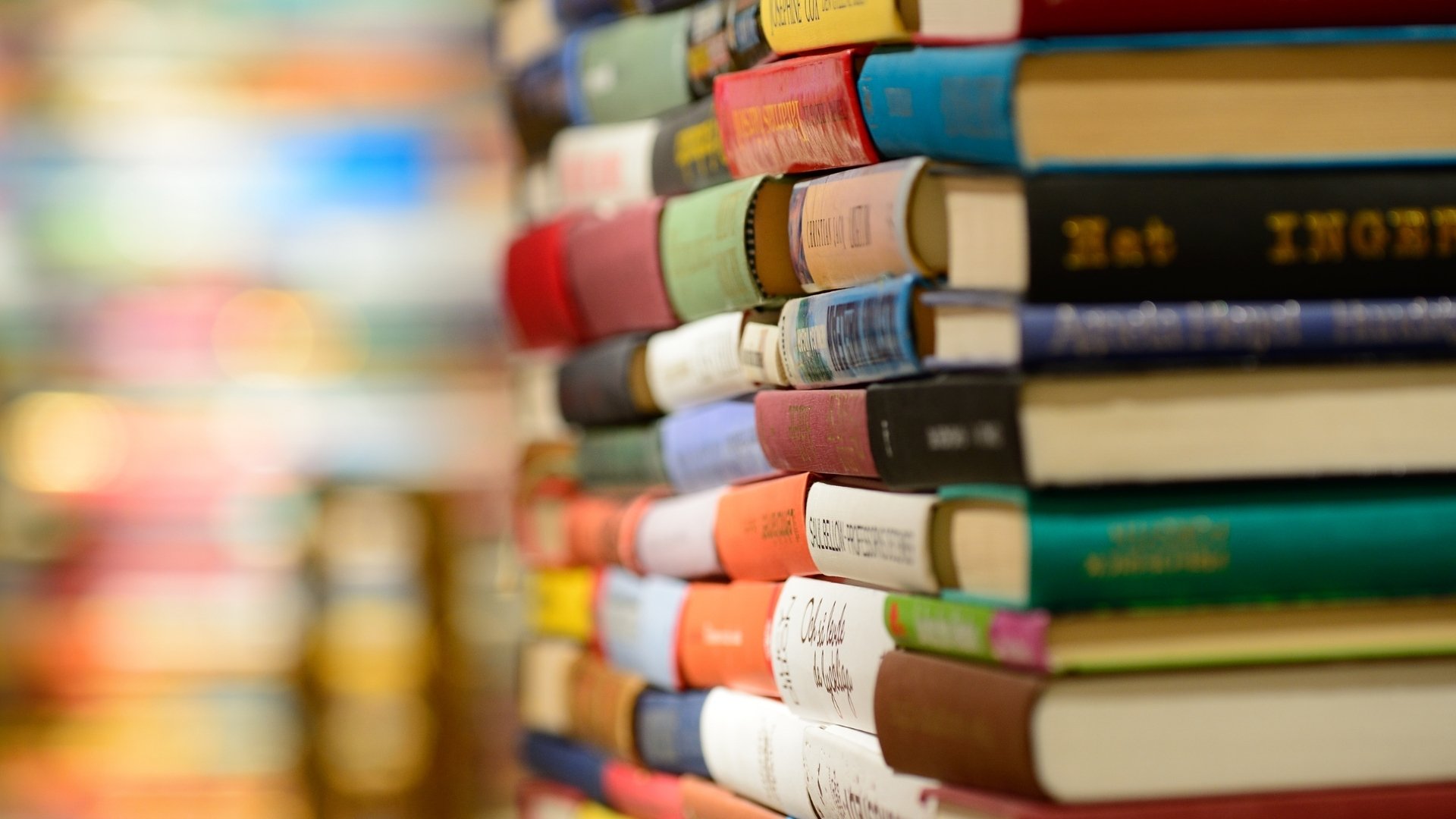pile of books in a library
