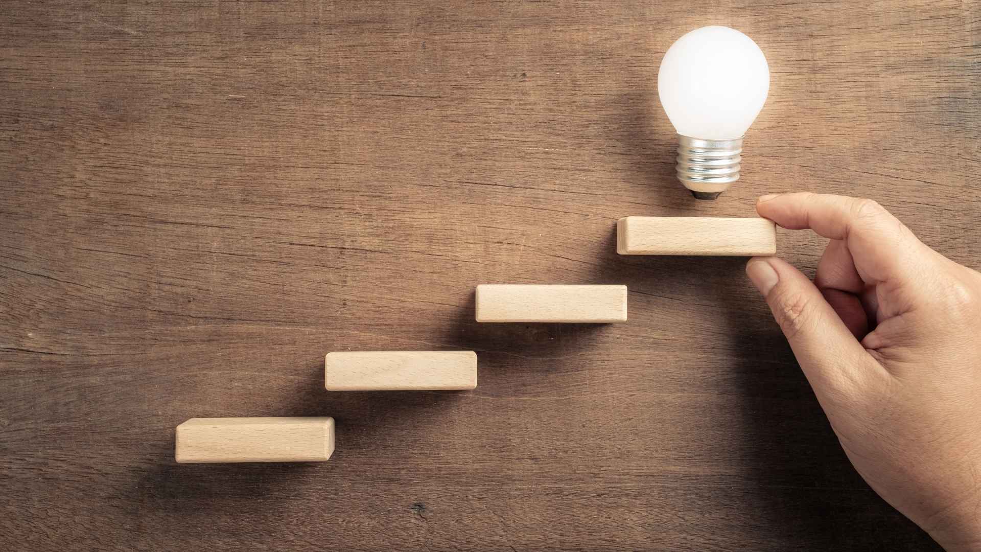 steps concept with bulb at the end