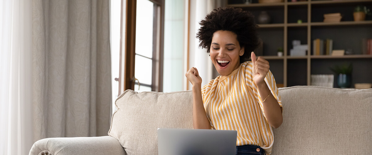 happy woman at computer