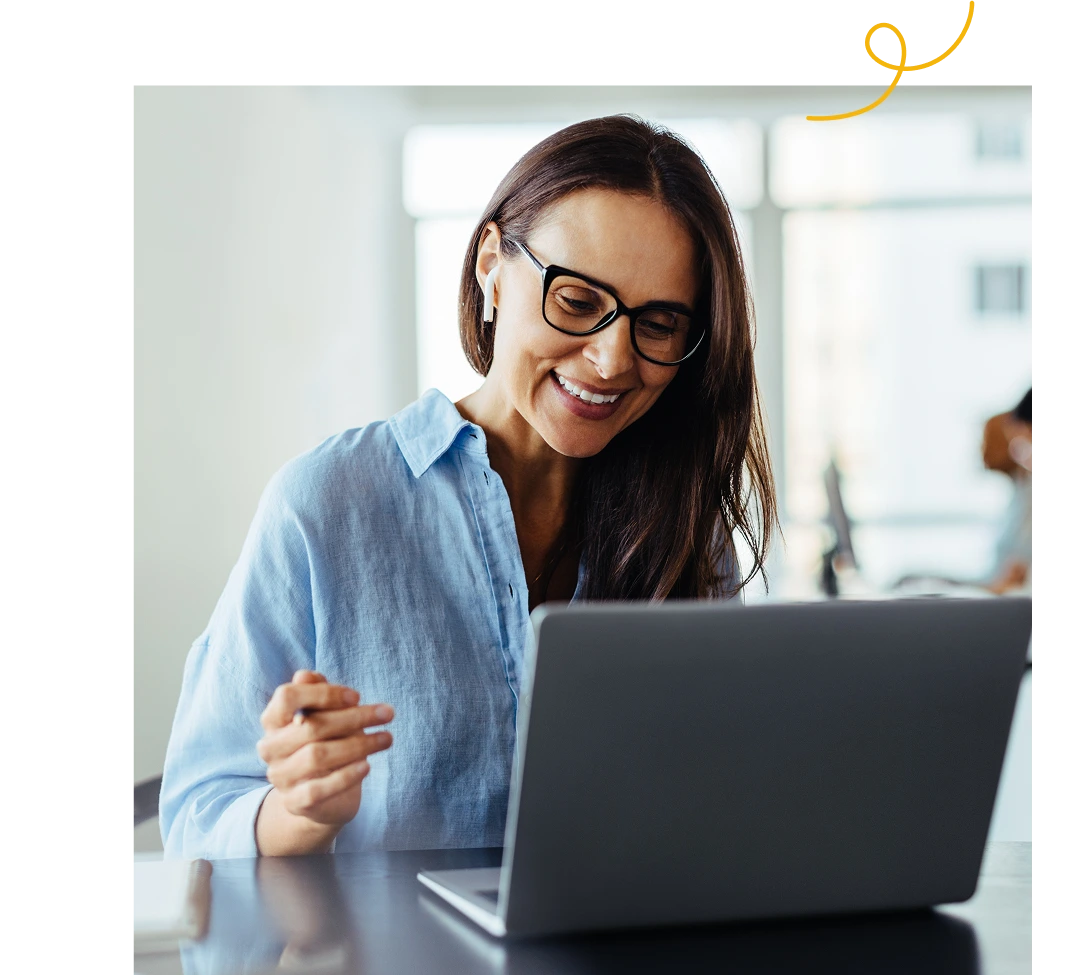 A happy women using a laptop
