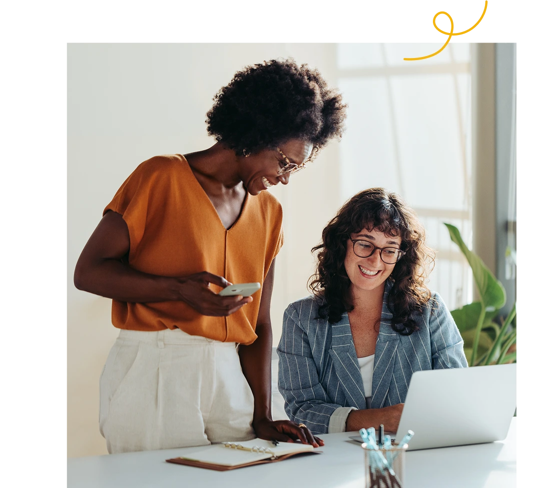 A person helping her co-worker