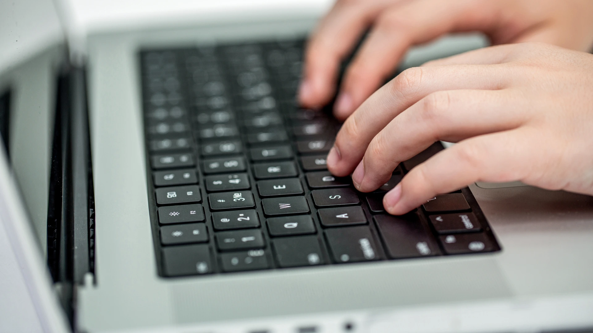 Close up shot of typing person
