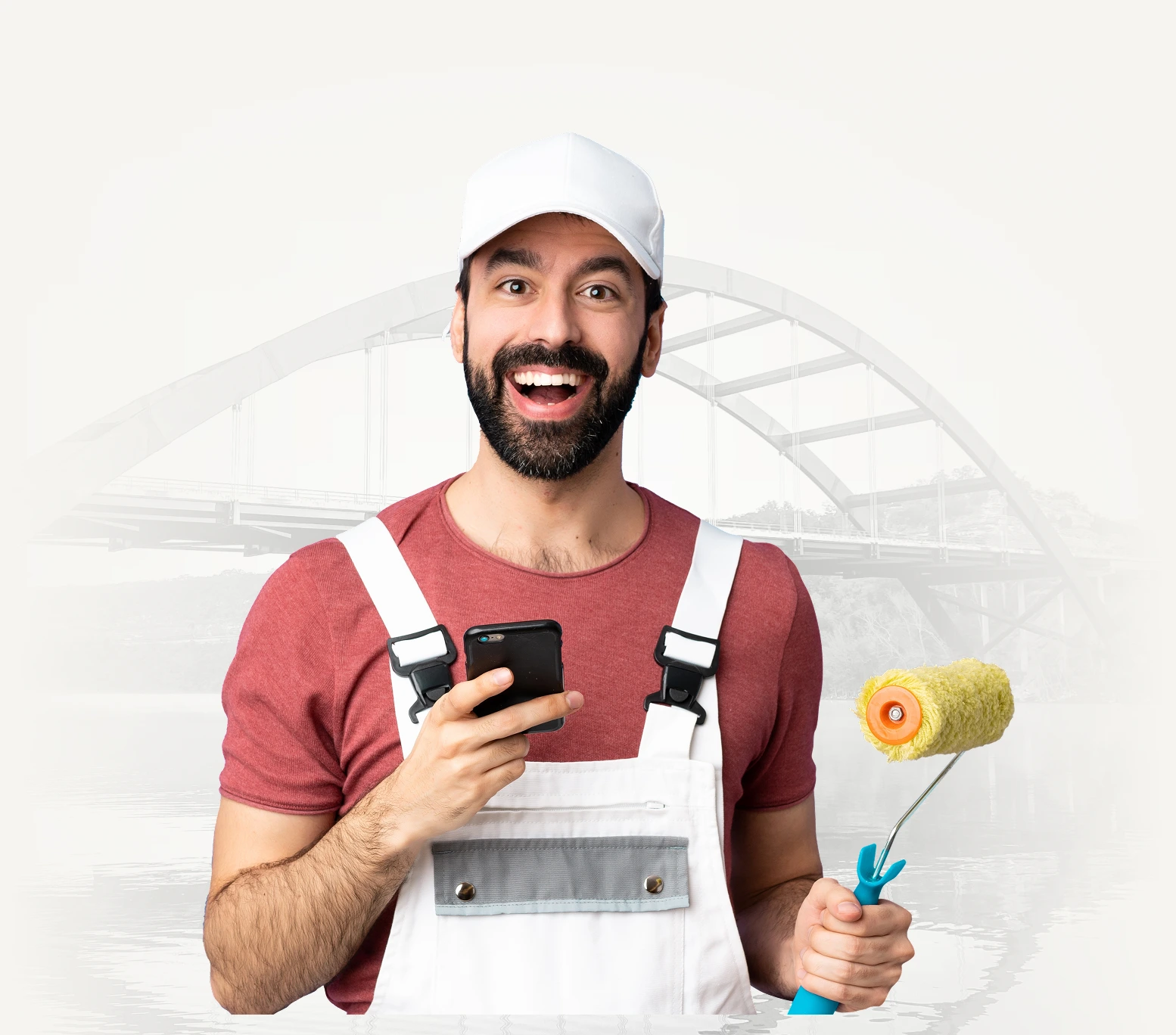 Happy painter using his phone